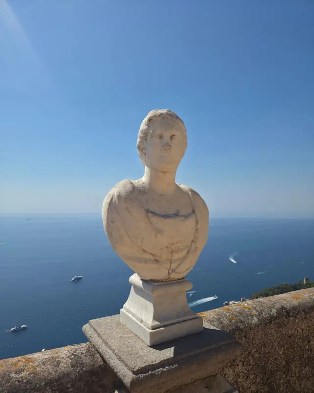 Marble bust on the terrace in Ravello, sea far below